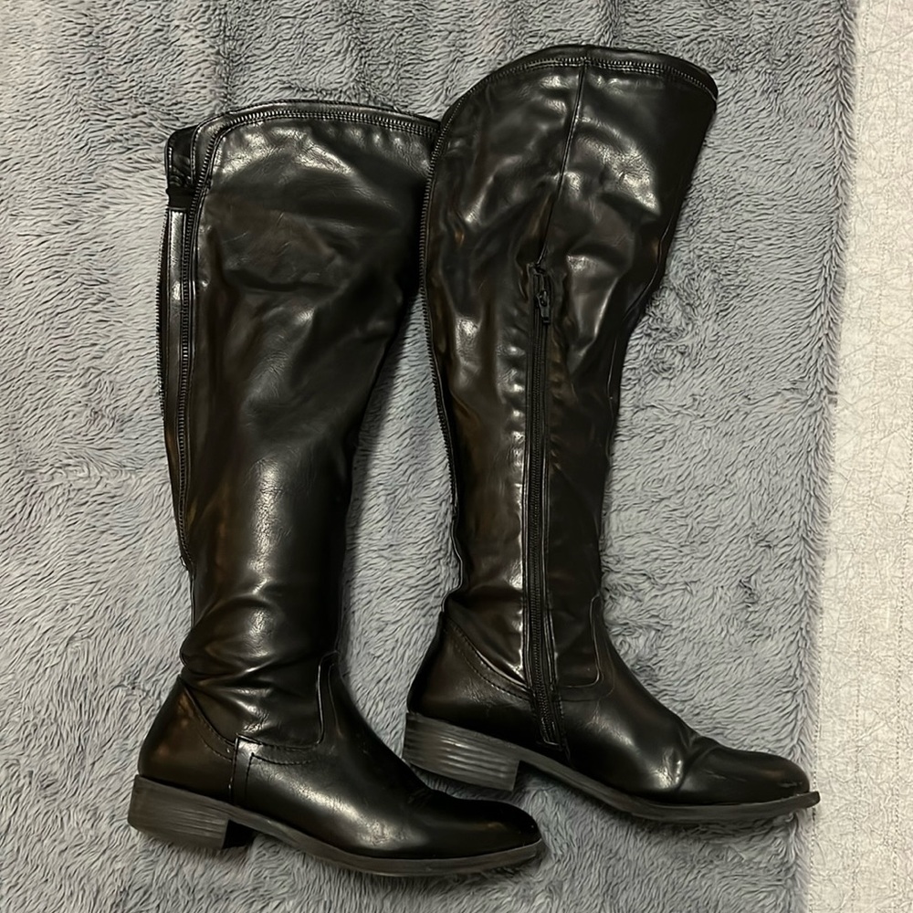 Women’s black below-the-knee boots
